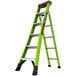 A green Little Giant King Kombo ladder with black handles.