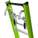 A green Little Giant fiberglass extension ladder with metal cable hooks.