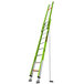 A green ladder with black handles.