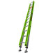 A green Little Giant HyperLite fiberglass extension ladder with silver handles.