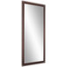 A rectangular BrandtWorks mirror with a dark walnut frame.