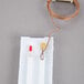 A Taylor 5327 Indoor / Outdoor Thermometer device with a wire.