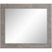 A BrandtWorks mirror with a barnwood gray finish wooden frame.