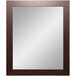 A BrandtWorks rectangular mirror with a dark walnut frame.