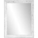 A white rectangular BrandtWorks mirror with a wooden frame.