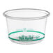 A clear Stalk Market PLA deli container with a green label.