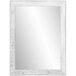 A white rectangular mirror with a wooden frame on a white wall.