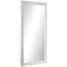 A white rectangular BrandtWorks mirror with a wooden frame.