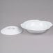 A CAC white porcelain pasta serving bowl with a lid.