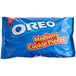 A blue package of Nabisco Oreo medium cookie pieces on a white background.