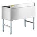 A Steelton stainless steel underbar ice bin with bottle holders on legs.