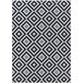 A black and white diamond patterned Couristan Afuera Dipole runner rug.