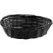 A Tablecraft black oval rattan basket with handles.