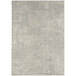 An Abani Layla Collection beige and brown area rug with a distressed animal print pattern.