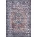 An Abani Lola vintage medallion area rug with blue, brown, and beige colors and an ornate pattern.