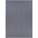 A Couristan runner rug with blue and grey geometric patterns.