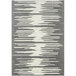 An Abani Casa Collection grey and white geometric area rug with jagged lines.