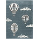 A blue area rug with hot air balloons and clouds in white.