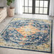 An Abani Casa Collection multicolor area rug with a traditional distressed floral design.