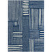 An Abani Casa Collection navy blue area rug with white geometric lines.
