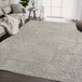 An Abani Layla Collection beige and brown distressed animal print area rug in a room.