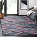 A multicolor Abani Parker Collection area rug with a woven ropes pattern.