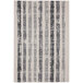 An Abani Casa Collection faded striped Moroccan area rug with black and white stripes.