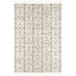 An Abani Layla Collection beige and brown farmhouse area rug with a diamond pattern and fringes.