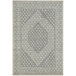 A close up of a cream and gray Abani Cabo Collection area rug with a hexagon medallion design.
