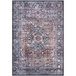 An Abani Lola vintage area rug with ornate blue, brown, and beige medallion pattern.