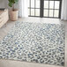 An Abani Casa Collection gray cheetah print area rug in a room.