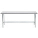 An Advance Tabco stainless steel work table with an open metal base.