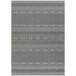 A grey and black woven rug with a geometric pattern.