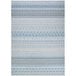 A close up of a blue and white Couristan Cape Gables area rug with geometric patterns.