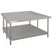 A stainless steel Advance Tabco work table with a stainless steel undershelf.