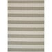 A tan and ivory striped Couristan rug with a white border.