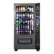 A Seaga refrigerated vending machine filled with a variety of drinks.