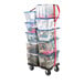 A Snap-Loc black dolly with plastic bins on it.
