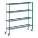 A green metal wire shelving unit with casters.