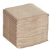 A large stack of Tork Xpressnap natural kraft dispenser napkins.