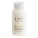 A white FarmHouse Fresh Botanical Blend body lotion bottle with black text and a white cap.