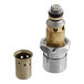 A Chicago Faucets NAIAD metering cartridge, a metal cylinder with brass and stainless steel parts and holes.