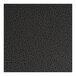 A close-up of a square indoor hammertone silver table top with a black and white surface.