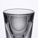 A close-up of a Libbey shot glass with a white background.