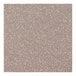 A close-up of a beige speckled surface on a Perfect Tables round concrete table top.