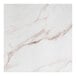 A white marble table top with copper veins.