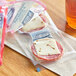 A package of Jack Link's hard salami and pepper jack cheese on a table.