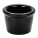 A Tuxton black ceramic ramekin.