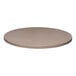 A close-up of a Perfect Tables 36" indoor round smooth concrete table top.