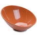 A GET pumpkin slanted melamine bowl on a white background.